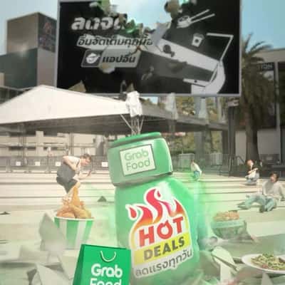 Sauce Bottle Crashes on Billboard in a fake-out-of-home ad of Grab