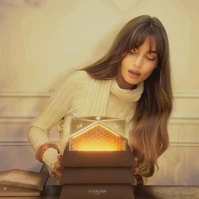 Serum Illuminates the Room in a fake-out-of-home ad of Guerlain