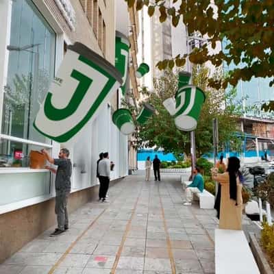 Coffee Cups Drops on the Street in a fake-out-of-home ad of J.Cafe