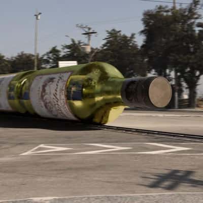 Wine Bottle Tram in a fake-out-of-home ad of Jurupinga Dinalle