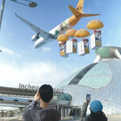 Plane Drops ATMs with Parachutes in a fake-out-of-home ad of Vogue