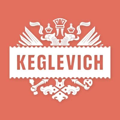 Airship Carries Peach-Filled Bottle in a fake-out-of-home ad of Keglevich