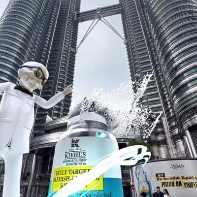 Serum Bottle Appears at Petronas Towers in a fake-out-of-home ad of Kiehl's