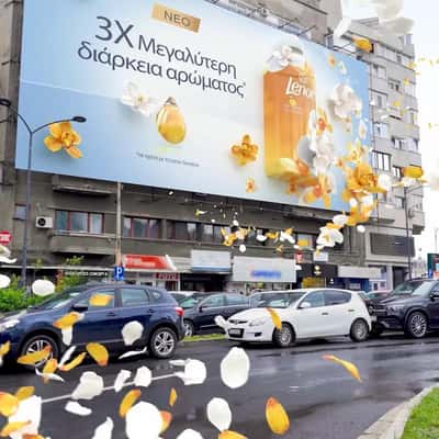 Billboard Overflows with Flowers in a fake-out-of-home ad of Lenor