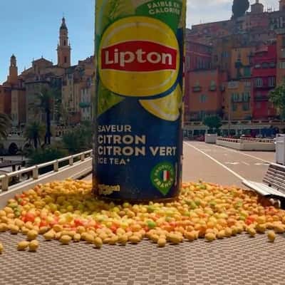 Canned Drink Wrapped with Lemons in a fake-out-of-home ad of Lipton Ice Te