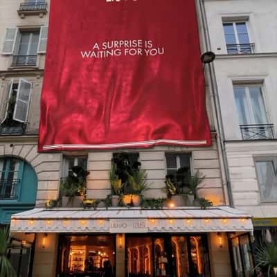 Red Banner Drapes Down Building in a fake-out-of-home ad of Liu Jo