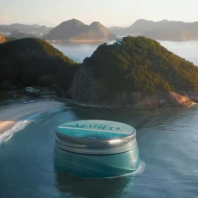 Body Cream Washes onto Beach in a fake-out-of-home ad of L'Occitane