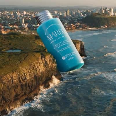 Serum Bottle Lands on the Coast in a fake-out-of-home ad of L'Occitane