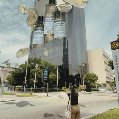 Building Showcases Hair Products in a fake-out-of-home ad of L'Oréal