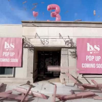 Pink Heart Balloons Pop at Shop in a fake-out-of-home ad of LYS Beauty