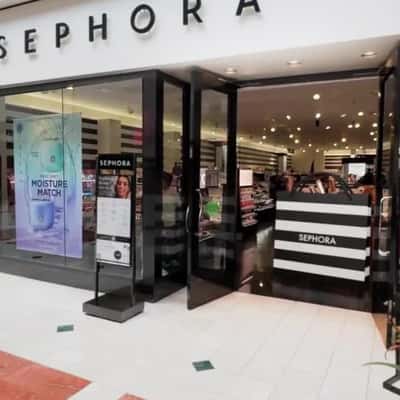 Shopping Bag Spills Beauty Products in a fake-out-of-home ad of LYS Beauty