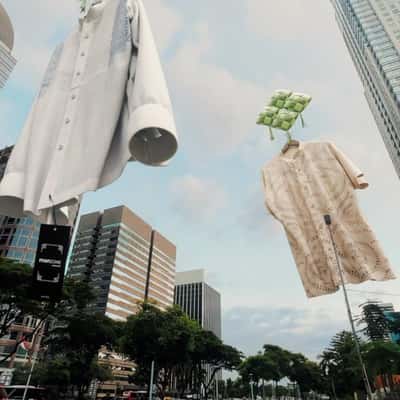 Shirts Hover Over Highway in a fake-out-of-home ad of Manzone