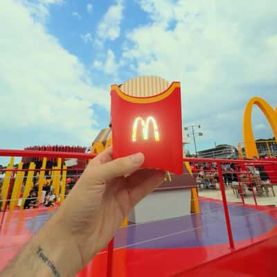 Fries Box Filled with Falling Fries in a fake-out-of-home ad of McDonald's