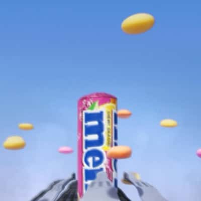 Candy Flying Saucers in a fake-out-of-home ad of Mentos
