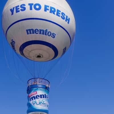 Gum Bottle Hot Air Balloon in a fake-out-of-home ad of Mentos