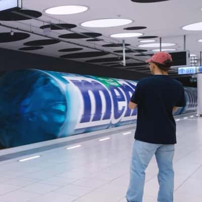 Candy-branded Subway Train in a fake-out-of-home ad of Mentos