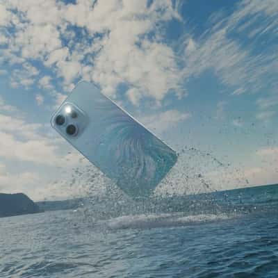 Smartphone Breaching in the Ocean in a fake-out-of-home ad of OPPO