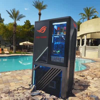 PC Tower Dispenses Soda Cans in a fake-out-of-home ad of Republic of Gamers
