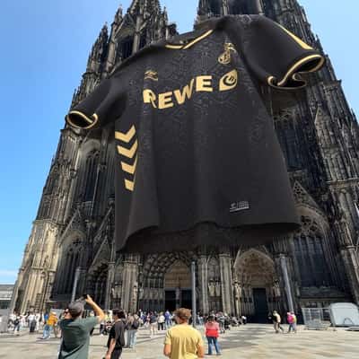 Jersey Hangs at Cologne Cathedral in a fake-out-of-home ad of FCKOELN