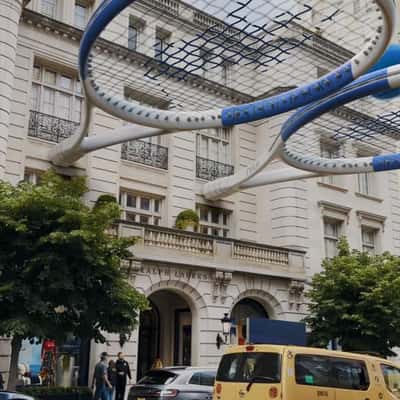 Tennis Rackets Fixed on Building in a fake-out-of-home ad of Ralph Lauren