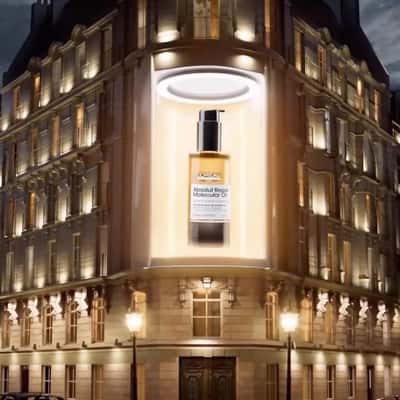 Hair Streams Out of Screen in a fake-out-of-home ad of L'Oréal