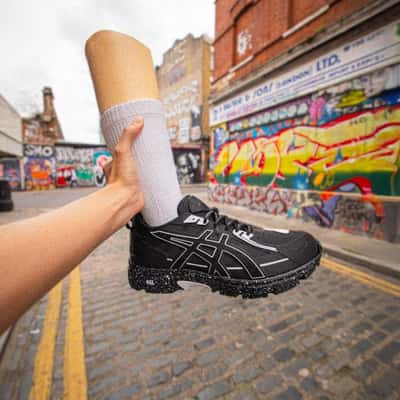 Prosthetic Leg Pulled from Portal in a fake-out-of-home ad of Foot Locker