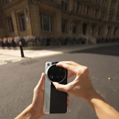 Smartphone Assembles on Street in a fake-out-of-home ad of Xiaomi
