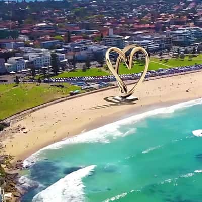Towering Golden Ring Installation in fake-out-of-home ad of Pandora