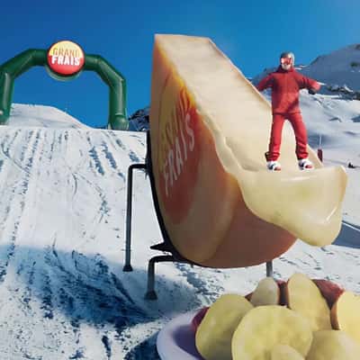 Ski Stunt on Melted Cheese Track in fake-out-of-home ad of Grand Frais