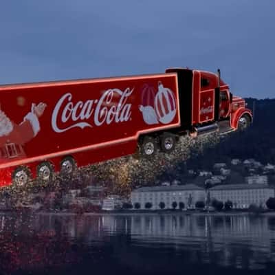 Christmas Truck Flies Across Austria in fake-out-of-home ad of Coca-Cola